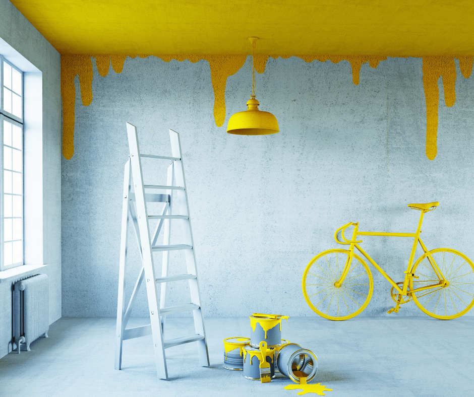 ladder in room with a painted yellow ceiling